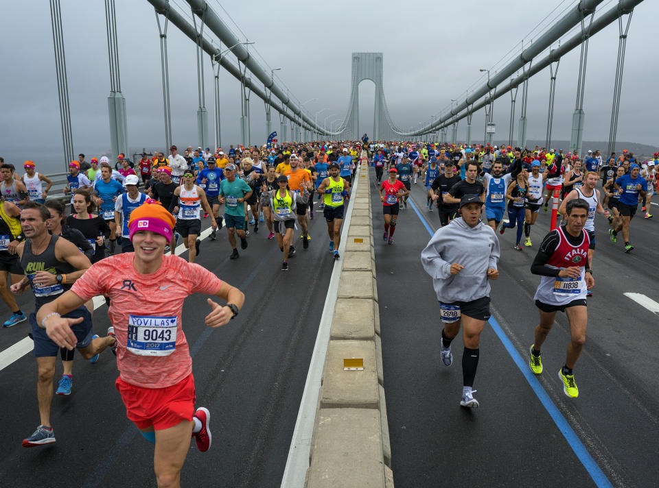 <p>Runners cross the Verrazano-Narrows Bridge during the New York City Marathon, Nov. 5, 2017, in New York. (Photo: Craig Ruttle/AP) </p>