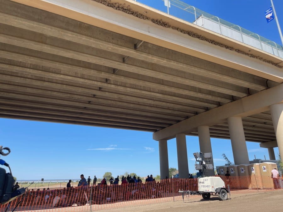 Commercial traffic is stalled above at the Camino Real International Bridge (Bridge 2) in Eagle Pass, Texas, on Sept. 21, 2023, due to mandatory truck inspections. Bridge 1 remains closed because federal border law enforcement officials are dealing with a surge of migrants who are seen under Bridge 2. (Sandra Sanchez/Border Report)
