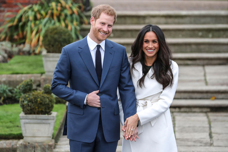 Image: Britain's Prince Harry and his fiancée Meghan Markle in the Sunken Garden at Kensington Palace on Nov. 27, 2017, following the announcement of their engagement. (Daniel Leal-Olivas / AFP - Getty Images file)