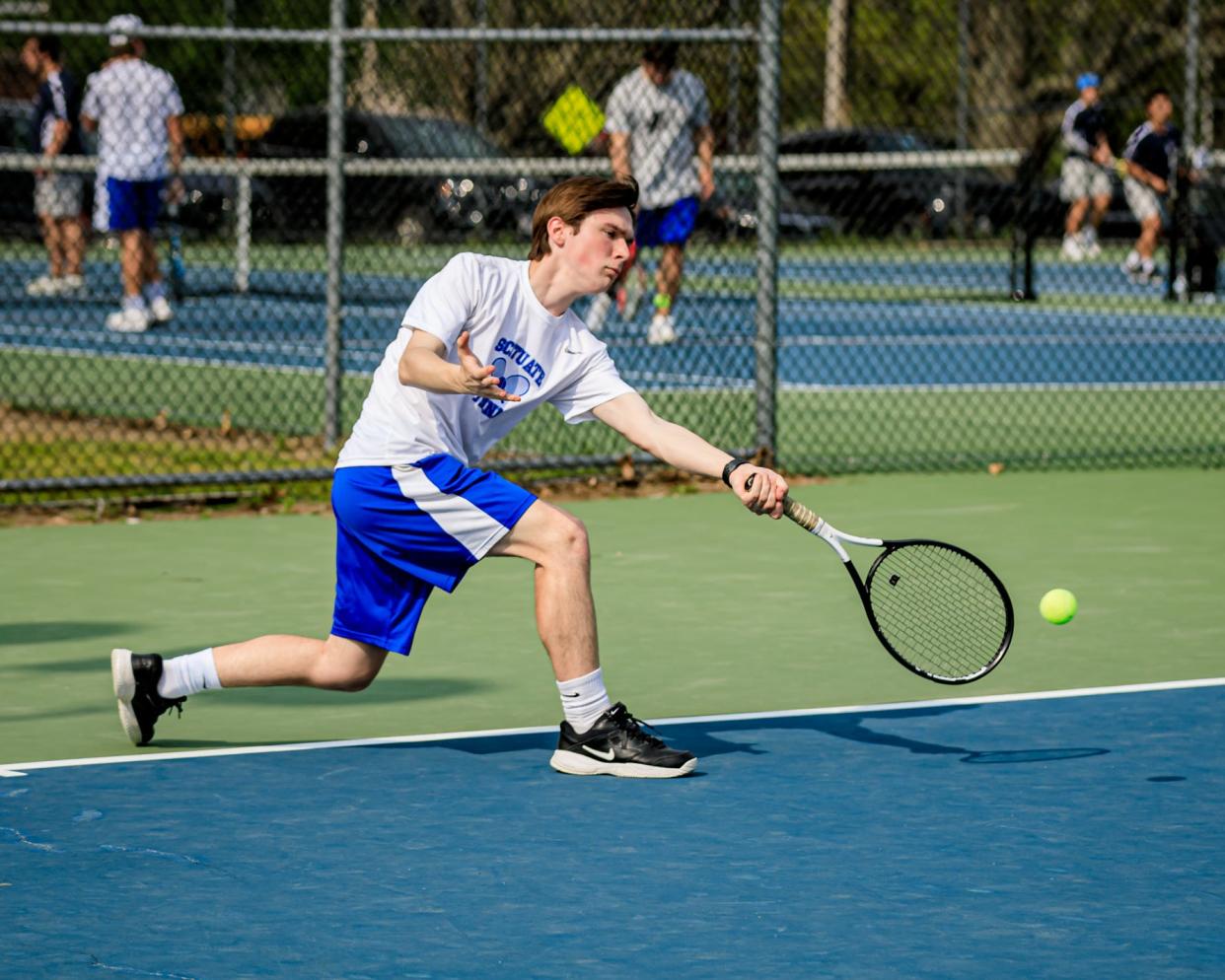 Ben Dipesa reaches for the ball.