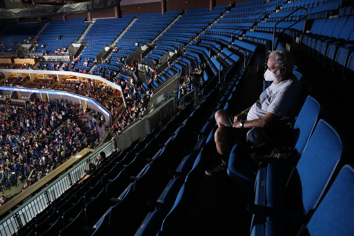 TULSA, OKLAHOMA - JUNE 20: A supporter sits in the upper seats during a campaign rally for U.S. President Donald Trump at the BOK Center, June 20, 2020 in Tulsa, Oklahoma. Trump is holding his first political rally since the start of the coronavirus pandemic at the BOK Center on Saturday while infection rates in the state of Oklahoma continue to rise. (Photo by Win McNamee/Getty Images)