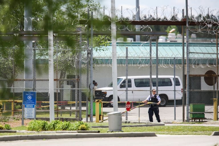 A guard at the entrance to the Lee Correctional Institution in Bishopville, South Carolina, where seven inmates were killed and 17 injured in clashes