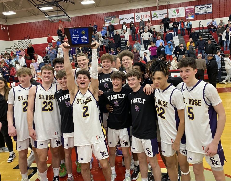 St. Rose players celebrate after beating Bishop Eustace for the NJSIAA South Non-Public B title on March 1, 2023.