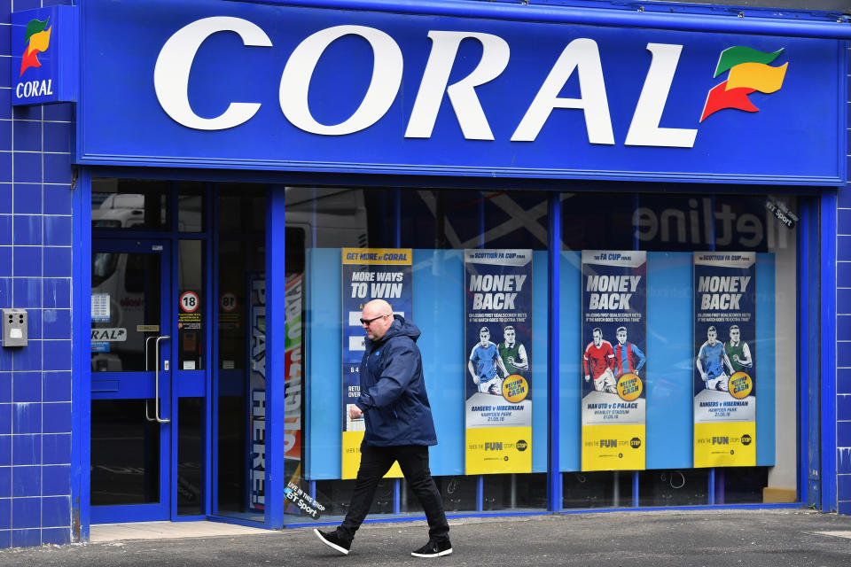 GLASGOW, SCOTLAND - MAY 20:  A general view of a Coral bookmakers on May 20, 2016 in Glasgow,Scotland. The high street bookmakers Ladbrokes and Coral may have to shed hundreds of jobs if their proposed merger is to go ahead, restricting competition in the business.  (Photo by Jeff J Mitchell/Getty Images)