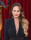 <p>Can Chrissy Teigen do no wrong? The model looked simply stunning with her bold coral lip and perfectly highlighted hair styled into bouncy curls. [Photo: Getty] </p>