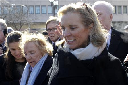 Kerry Kennedy, (R ) daughter of assassinated Senator Robert F. Kennedy and the ex-wife of New York Governor Andrew Cuomo, exits the Westchester County Courthouse in White Plains, New York, February 28, 2014. REUTERS/Eduardo Munoz