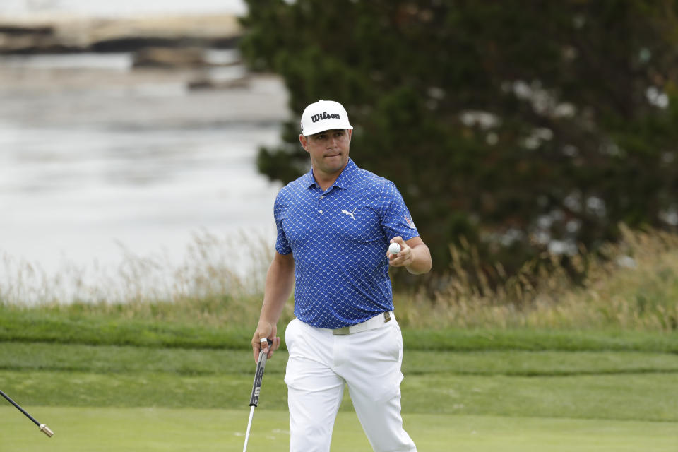 Gary Woodland waves after his putt on the fifth hole during the third round of the U.S. Open golf tournament Saturday, June 15, 2019, in Pebble Beach, Calif. (AP Photo/Matt York)