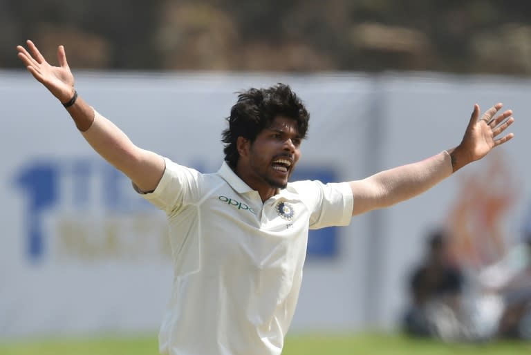 Indian bowler Umesh Yadav celebrates after dismissing Sri Lanka's Dimuth Karunaratne on the second day of the first Test in Galle on July 27, 2017