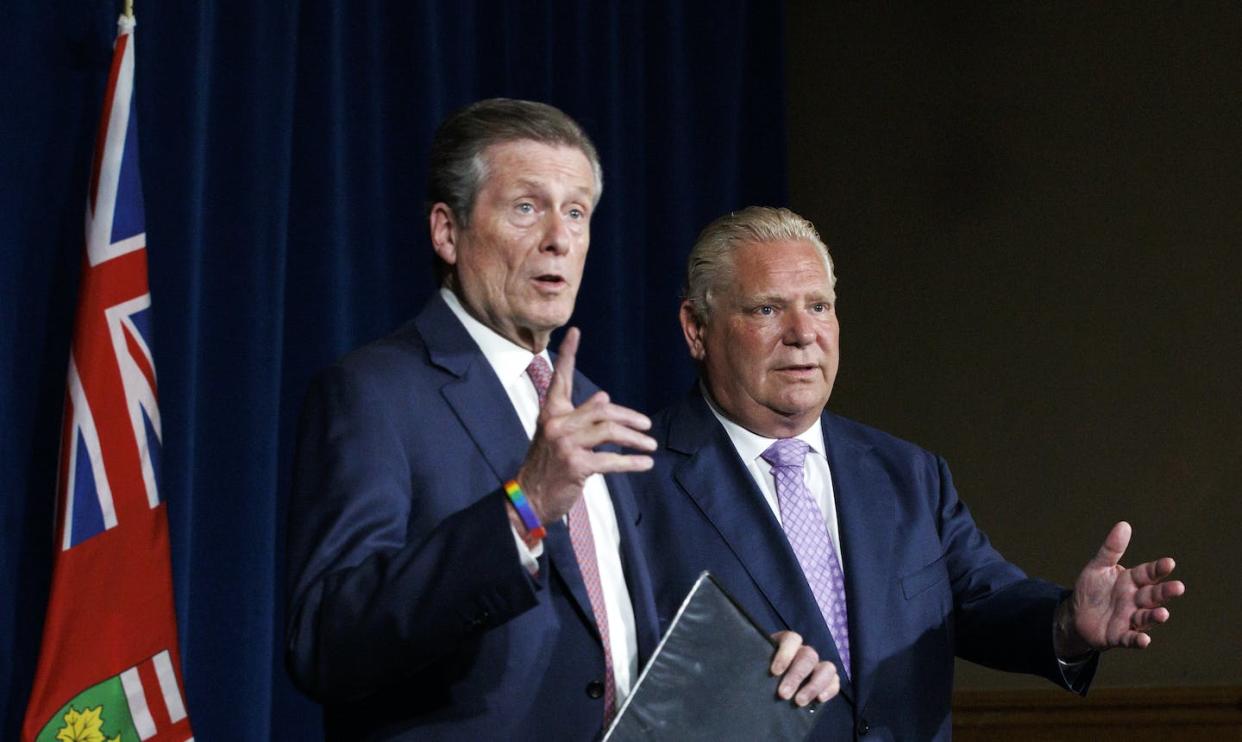 Toronto Mayor John Tory speaks alongside Ontario premier Doug Ford during a joint news conference in Toronto in June 2022. THE CANADIAN PRESS/Cole Burston