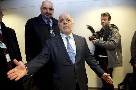 Iraqi Prime Minister Haider al-Abadi arrives for a meeting with U.S. Secretary of State John Kerry at the 2016 World Economic Forum in Davos, Switzerland, January 21, 2016. REUTERS/Jacquelyn Martin/Pool