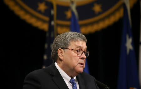 U.S. Attorney General William Barr speaks during a farewell ceremony for Deputy Attorney General Rod Rosenstein at the U.S. Department of Justice in Washington, U.S., May 9, 2019. REUTERS/Leah Millis