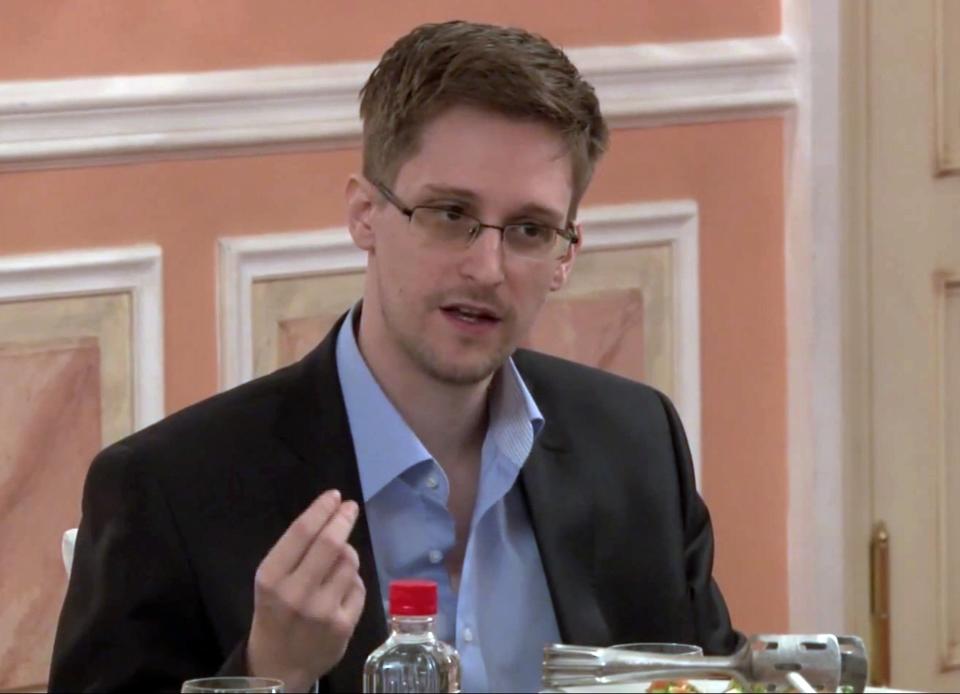 In this image made from video released by WikiLeaks on Friday, Oct. 11, 2013, former National Security Agency systems analyst Edward Snowden speaks during a presentation ceremony for the Sam Adams Award in Moscow, Russia. Should Snowden ever return to the U.S., he would face criminal charges for leaking information about NSA surveillance programs. But legal experts say a trial could expose more classified information as his lawyers try to build a case in an open court that the operations he exposed were illegal. (AP Photo)