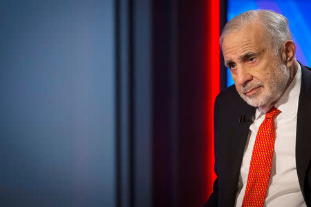 FILE PHOTO: Billionaire activist-investor Carl Icahn gives an interview on FOX Business Network's Neil Cavuto show in New York, U.S. on February 11, 2014. REUTERS/Brendan McDermid/File Photo