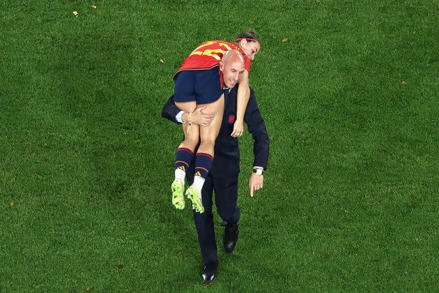 Luis Rubiales carries Spain's Athenea del Castillo Beivide on his shoulder following the team's Women's World Cup victory.