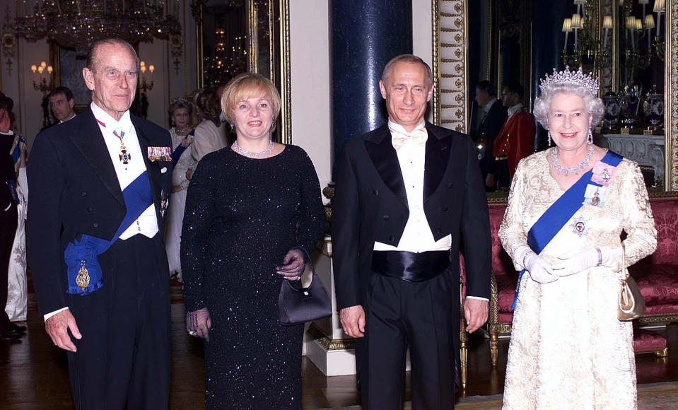 Queen Elizabeth II (right) and her husband, the Duke of Edinburgh (left) stand alongside Russias President Putin and his wife, Lyudmila, before a state banquet at Buckingham Palace.  *   Earlier, Mr Putin, who is on the first state visit by a Russian leader since 1874 when Tsar Alexander II came to Britain, had been delayed by 15 minutes aftes his motorcade was delayed by heavy traffic as it travelled from London s Heathrow Airport to Horse Guards Parade for the official welcoming ceremony.