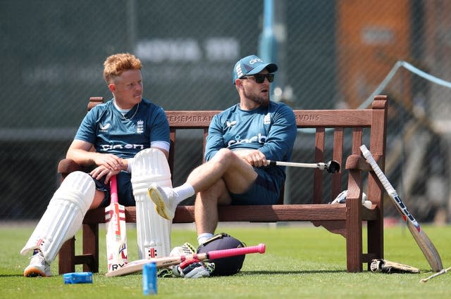 Brendon McCullum, right, was delighted with Ollie Pope's attitude despite his pair in Ranchi (Simon Marper/PA)