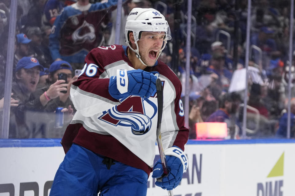 Colorado Avalanche's Mikko Rantanen celebrates after scoring a goal against the New York Islanders during the third period of an NHL hockey game Tuesday, Oct. 24, 2023, in Elmont, N.Y. (AP Photo/Frank Franklin II)