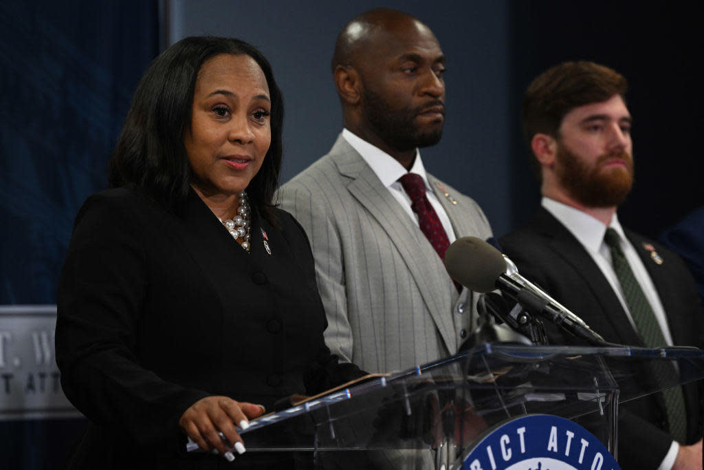 File: Fulton County District Attorney Fani Willis at a news conference on Aug. 14, 2023 in Atlanta. Special prosecutor Nathan Wade stands next to her. / Credit: Joshua Lott/The Washington Post via Getty Images