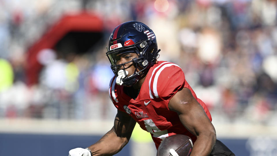 FILE - Mississippi running back Quinshon Judkins (4) runs the ball during the second half of an NCAA college football game against Louisiana Monroe in Oxford, Miss., Saturday, Nov. 18, 2023. The much-anticipated matchup in Saturday’s Peach Bowl is No. 10 Penn State’s top-ranked defense against No. 11 Mississippi’s up-tempo offense. (AP Photo/Thomas Graning, File)