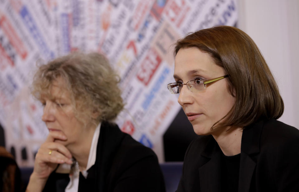 Doris Wagner, former nun, survivor, theologian and author, attends the press conference "Voices of Faith, women's abuse survivors' group: Overcoming" at the Foreign Press association in Rome, Tuesday Feb. 19, 2019. At left is Regina Franken-Wendelstorf, researcher, lecturer and former member of the Third Order of the Dominicans. Pope Francis is hosting a four-day summit on preventing clergy sexual abuse, a high-stakes meeting designed to impress on Catholic bishops around the world that the problem is global and that there are consequences if they cover it up. (AP Photo/Alessandra Tarantino)