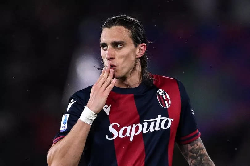 Liverpool-linked Riccardo Calafiori in action for Bologna.