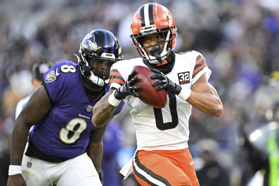 Cleveland Browns cornerback Greg Newsome II returns an interception for a touchdown against the Ravens on Sunday. (AP Photo/Terrance Williams)