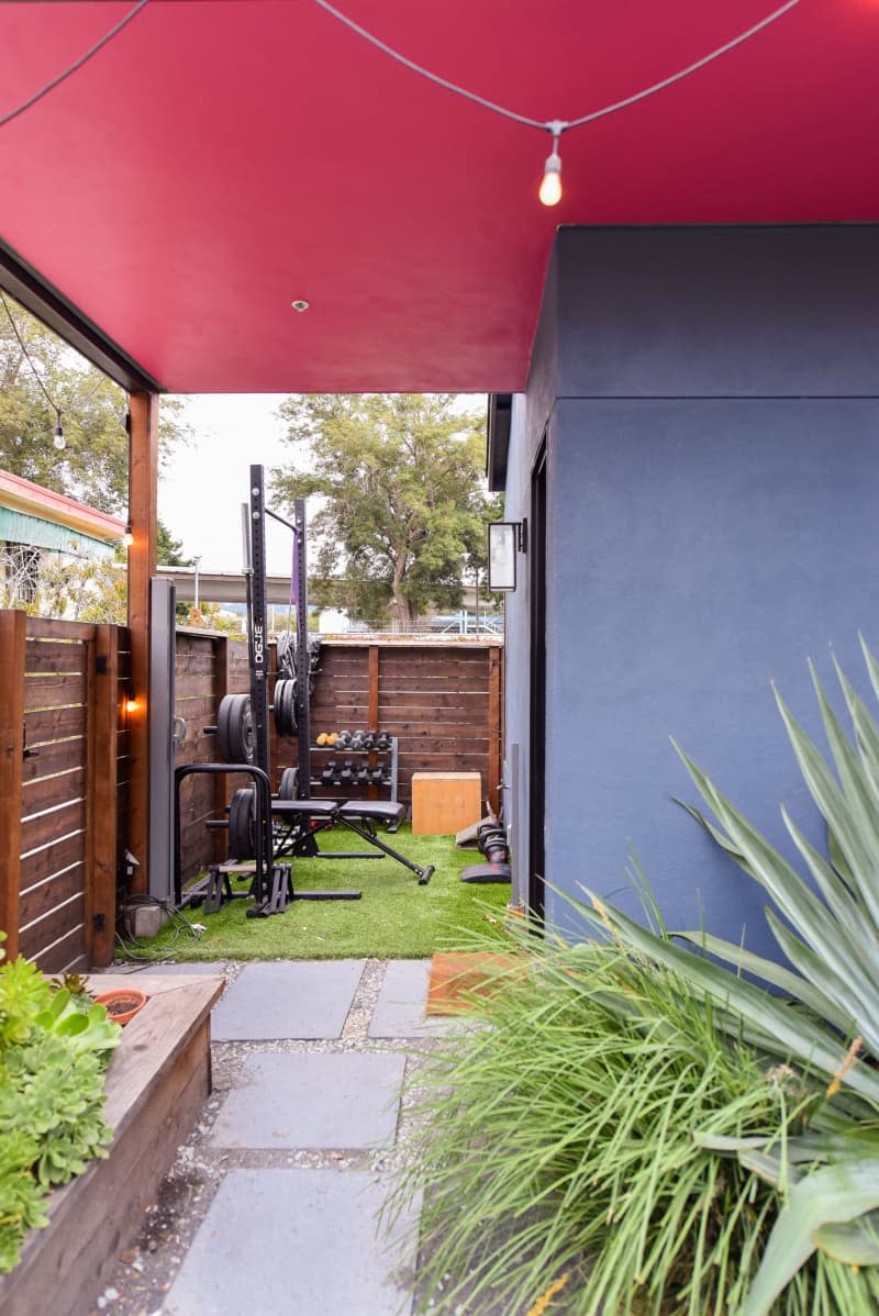 Weights in covered outdoor area of home.
