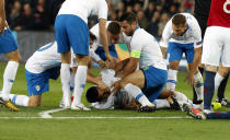 Slovenia's Luka Krajnc lies on the pitch injured during the UEFA Nations League soccer match between Norway and Slovenia at Ullevaal Stadium, Norway, Saturday Oct. 13, 2018. (Terje Bendiksby/NTB scanpix via AP)