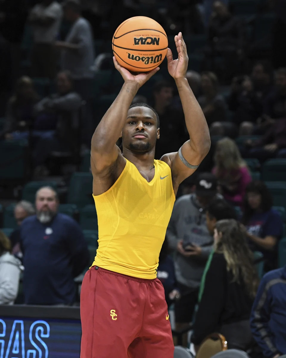 Southern California guard Bronny James warms up before an NCAA college basketball game against Gonzaga Saturday, Dec. 2, 2023, in Las Vegas. (AP Photo/Sam Morris)