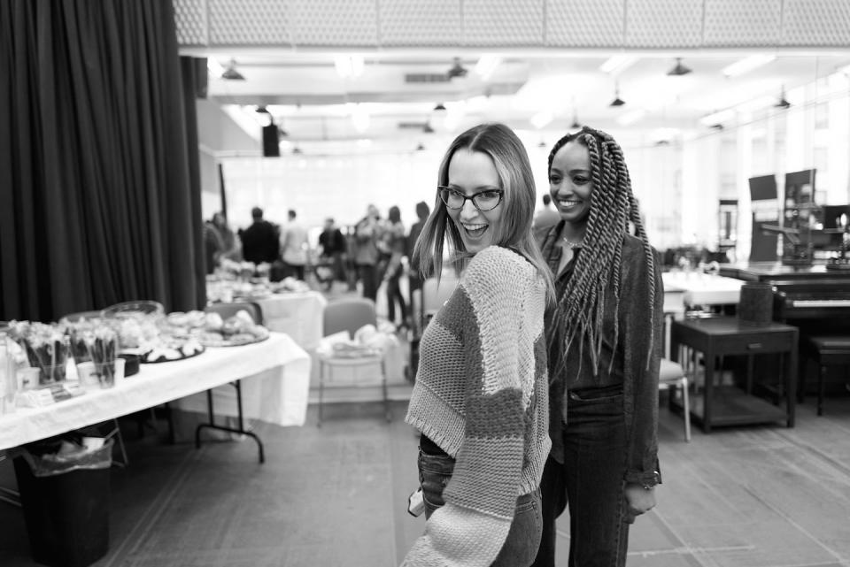 a couple of women posing for the camera