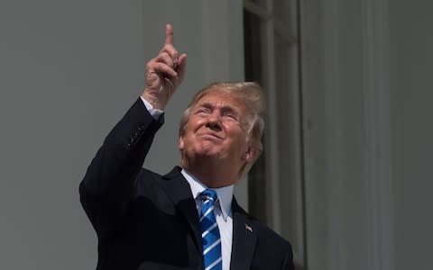 Donald trump Solar eclipse - Credit: AFP