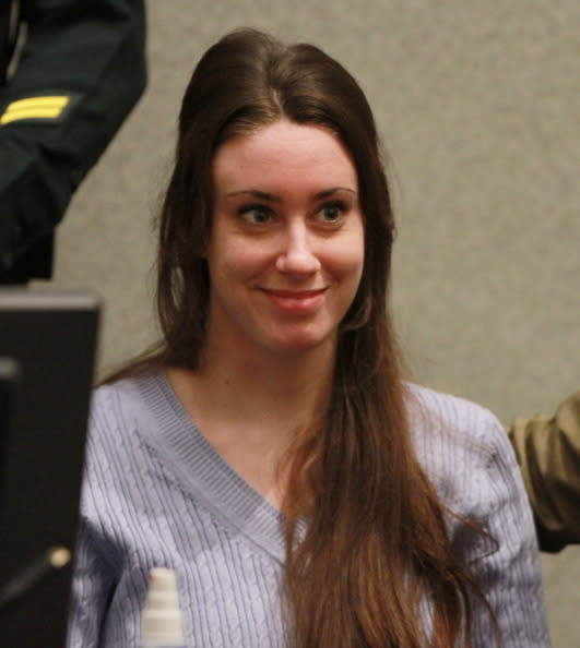 ORLANDO, FL – JULY 07: Casey Anthony smiles before the start of her sentencing hearing on charges of lying to a law enforcement officer at the Orange County Courthouse July 7, 2011 in Orlando, Florida. Anthony was acquitted of murder charges on July 5, 2011 but will serve four, one-year sentences on her conviction of lying to a law enforcement officer. She will be credited for the nearly three-years of time served and good behavior and will be released July 13. (Photo by Joe Burbank-Pool/Getty Images)