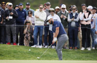 Jon Rahm, of Spain, chips onto the third green during the third round of the Genesis Invitational golf tournament at Riviera Country Club, Saturday, Feb. 18, 2023, in the Pacific Palisades area of Los Angeles. (AP Photo/Ryan Kang)