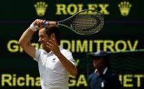 Richard Gasquet of France in action against Bulgaria's Grigor Dimitrov in the Wimbledon third round on July 3, 2015