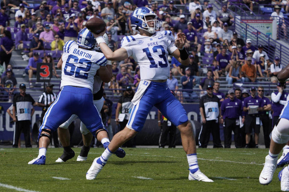 Duke quarterback Riley Leonard (13) looks to pass against Northwestern during the first half of an NCAA college football game, Saturday, Sept.10, 2022, in Evanston, Ill. (AP Photo/David Banks)