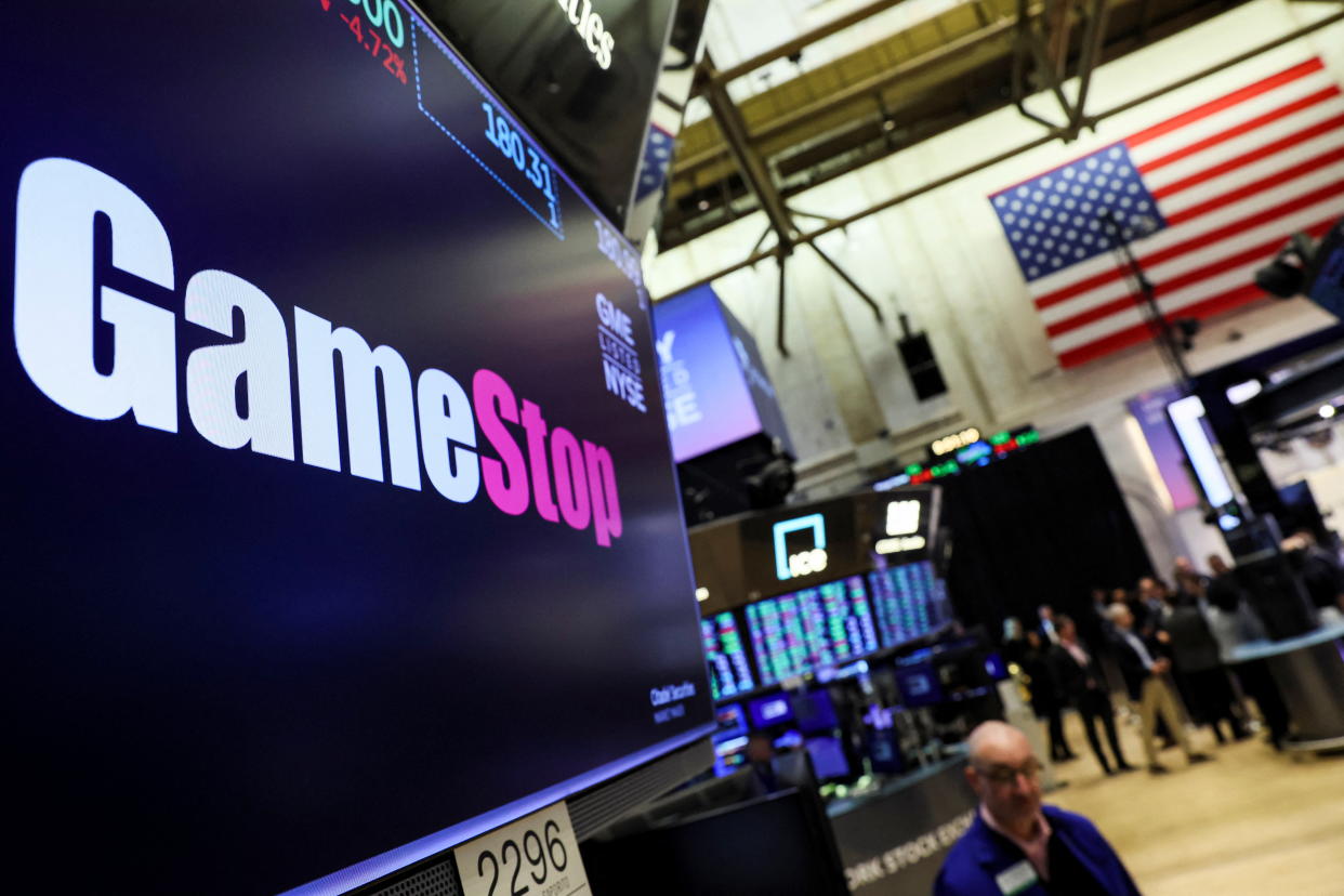A screen displays the logo and trading information for GameStop on the floor of the New York Stock Exchange (NYSE) in New York City, U.S., March 29, 2022.  REUTERS/Brendan McDermid