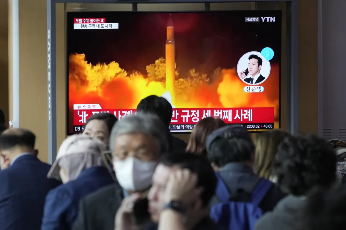 N. Korea fires missile, artillery shells, inflaming tensions