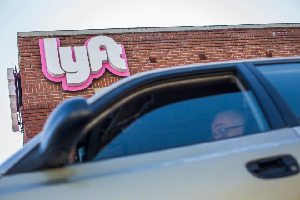A driver rides his car in front of the Lyft Drivers Hub in Los Angeles, California, March 29, 2019. - Ride-hailing company Lyft made its Initial Public Offering (IPO) on the Nasdaq Stock Market on March 29th. (Photo by Apu Gomes / AFP)        (Photo credit should read APU GOMES/AFP/Getty Images)
