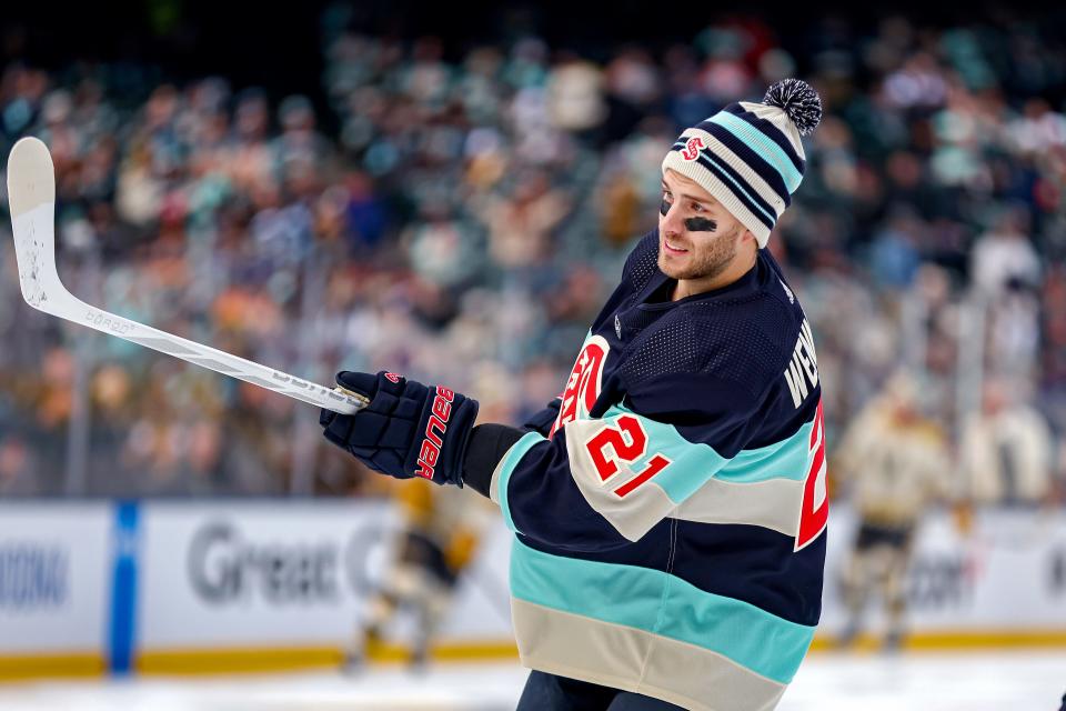 SEATTLE, WASHINGTON - JANUARY 01: Alex Wennberg #21 of the Seattle Kraken warms up prior to the game against the Vegas Golden Knights during the first period at T-Mobile Park on January 01, 2024 in Seattle, Washington.