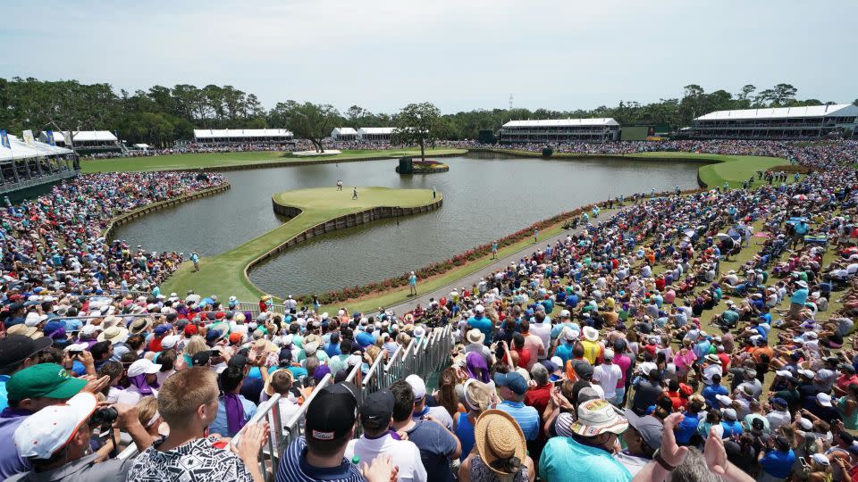 Fans flock to the iconic 17th island green at TPC Sawgrass to watch Tiger Woods at the 2018 Players Championship. - Richard Heathcote / Getty Images