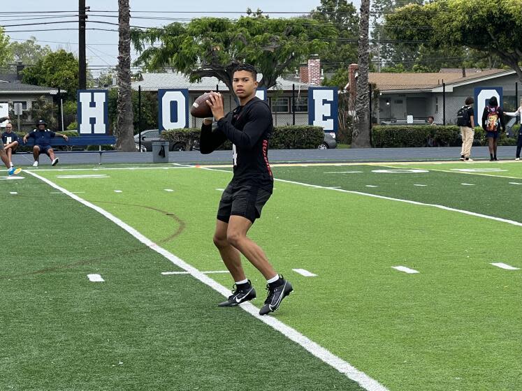 Corona Centennial quarterback Husan Longstreet j