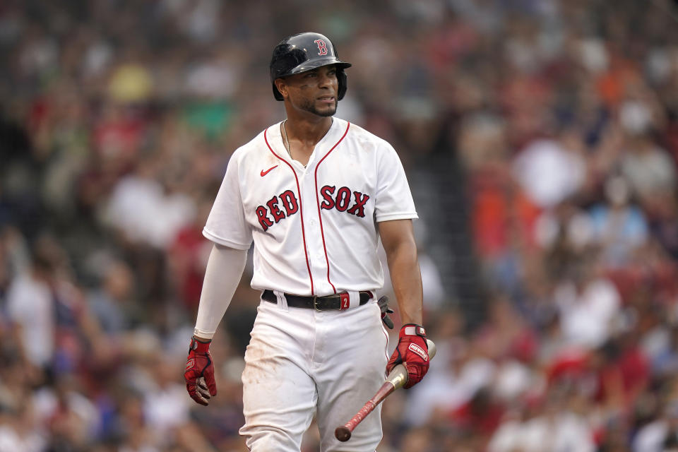 Boston Red Sox's Xander Bogaerts reacts after he struck out looking in the ninth inning of a baseball game against the Philadelphia Phillies, Sunday, July 11, 2021, in Boston. (AP Photo/Steven Senne)