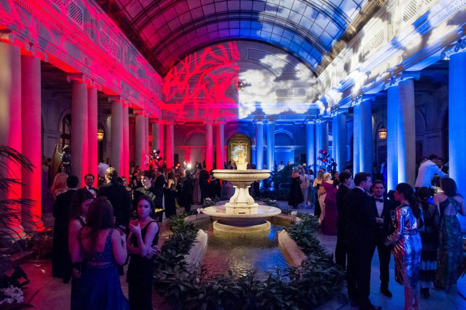 Guests mingle in the Garden Court