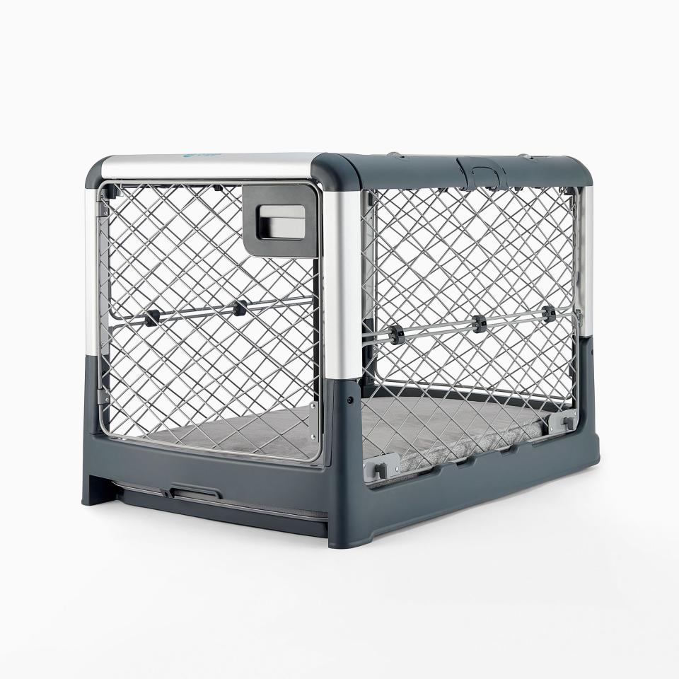 <p><a href="https://go.redirectingat.com?id=74968X1596630&url=https%3A%2F%2Fwww.diggs.pet%2Fproducts%2Frevol-collapsible-dog-crate%2F&sref=https%3A%2F%2Fwww.countryliving.com%2Fshopping%2Fa42817241%2Fdiggs-collapsible-dog-crate%2F" rel="nofollow noopener" target="_blank" data-ylk="slk:Shop Now;elm:context_link;itc:0;sec:content-canvas" class="link ">Shop Now</a></p><p>Revol Collapsible Dog Crate</p><p>$356.25</p><p>diggs.pet</p>