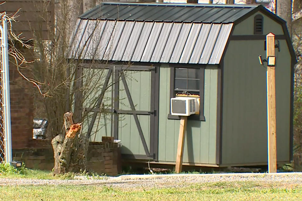 A house and outbuilding, right, where Jorge Camacho is believed to have been living, in Lexington, N.C., on Monday. (WXII)