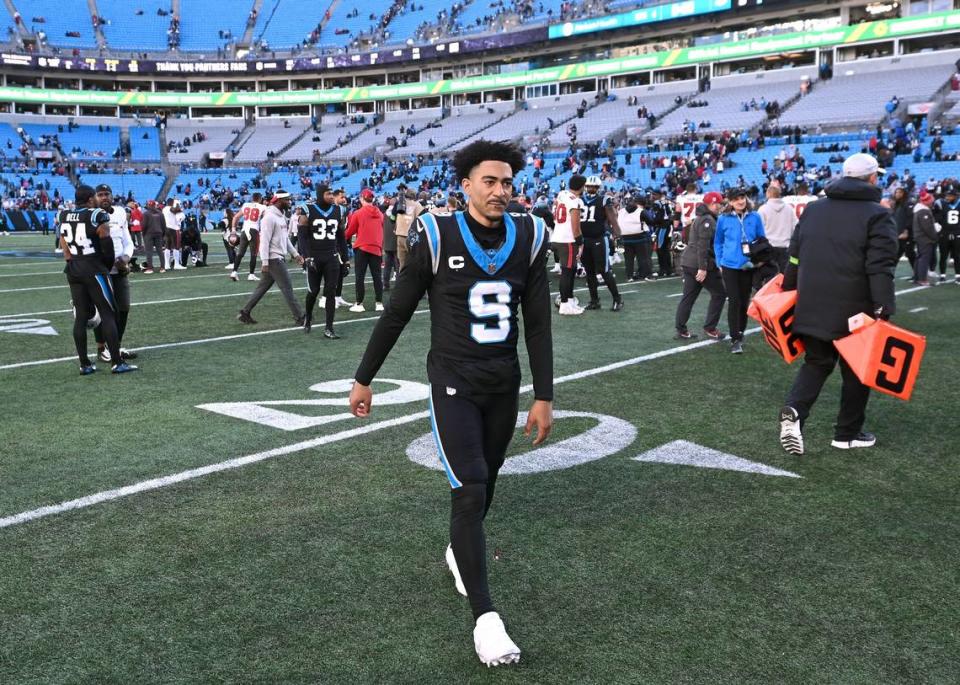 Carolina Panthers quarterback Bryce Young walks off the field following the team’s 9-0 loss to the Tampa Bay Buccaneers at Bank of America Stadium in Charlotte, NC on Sunday, January 7, 2024. In a terrible season offensively, the Panthers were shut out in each of their final two games.