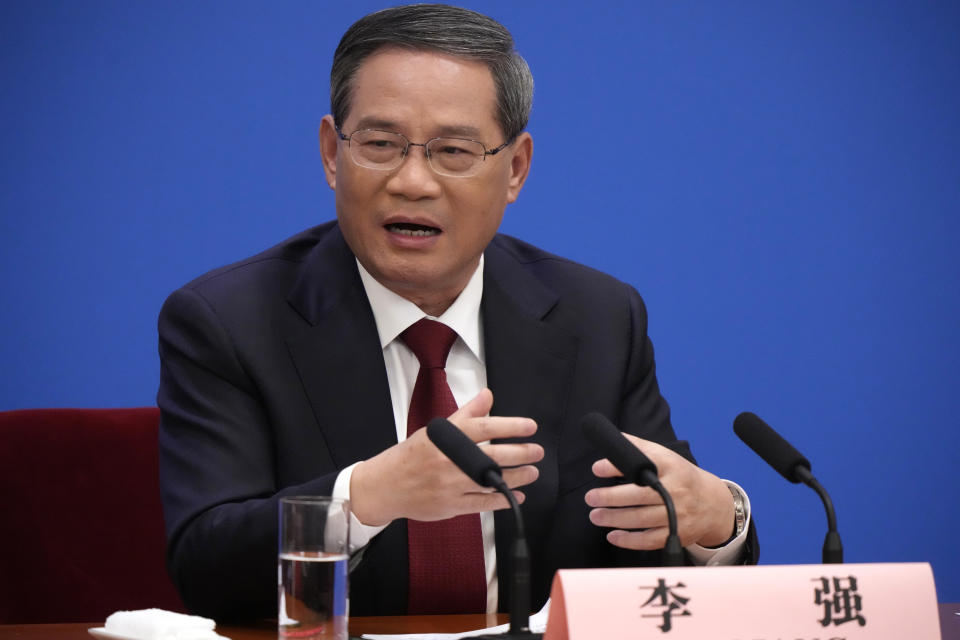 FILE - Chinese Premier Li Qiang speaks during a press conference after the closing ceremony for China's National People's Congress (NPC) at the Great Hall of the People in Beijing, March 13, 2023. China’s new No. 2 leader said Thursday, March 30, its economic recovery gained pace in March and tried to reassure foreign companies the country is committed to opening to the world.(AP Photo/Mark Schiefelbein, File)