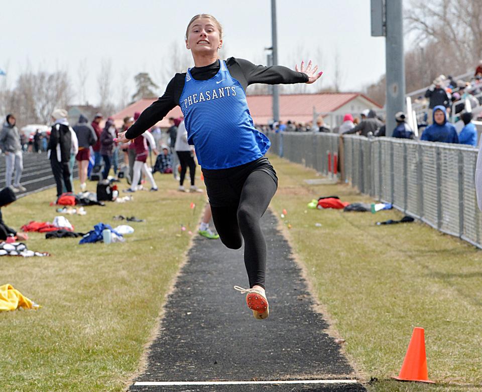 Redfield's Camryn Rohlfs competes in the girls' long jump during the Pat Gilligan Alumni track and field meet on Tuesday, April 25, 2023 in Estelline.