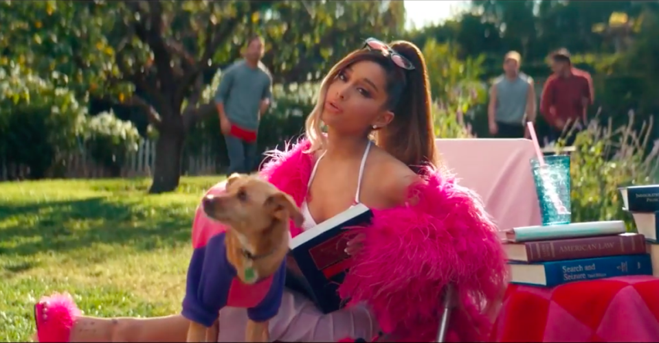 Ariana Grande and her dog Toulouse channel <em>Legally Blonde</em>‘s Elle Woods and Bruiser. (Image: YouTube)