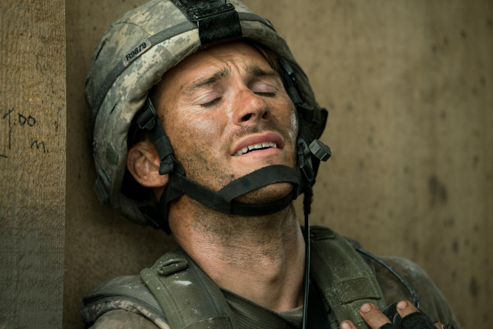 This image released by Screen Media shows Scott Eastwood in a scene from "The Outpost." The film tells the story of the heroic Battle of Kamdesh in Afghanistan in 2009, where the Taliban attacked a remote American Combat Outpost that was nearly impossible to defend. (Screen Media via AP)